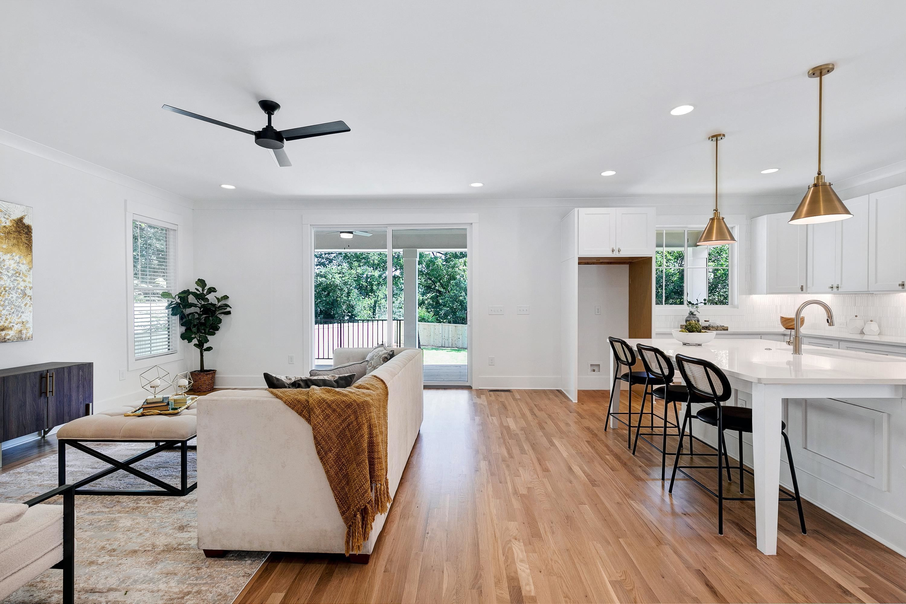 118 Summit Avenue Raleigh, NC 27603 - Photo 8 of 30 a living room with furniture and a wooden floor