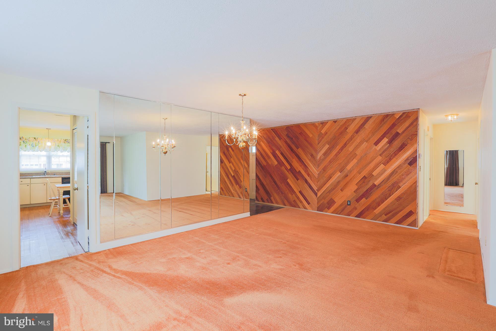 7245 Fairbrook Road Baltimore, MD 21244 - Photo 14 of 40 Dining area with decorative wood accent wall