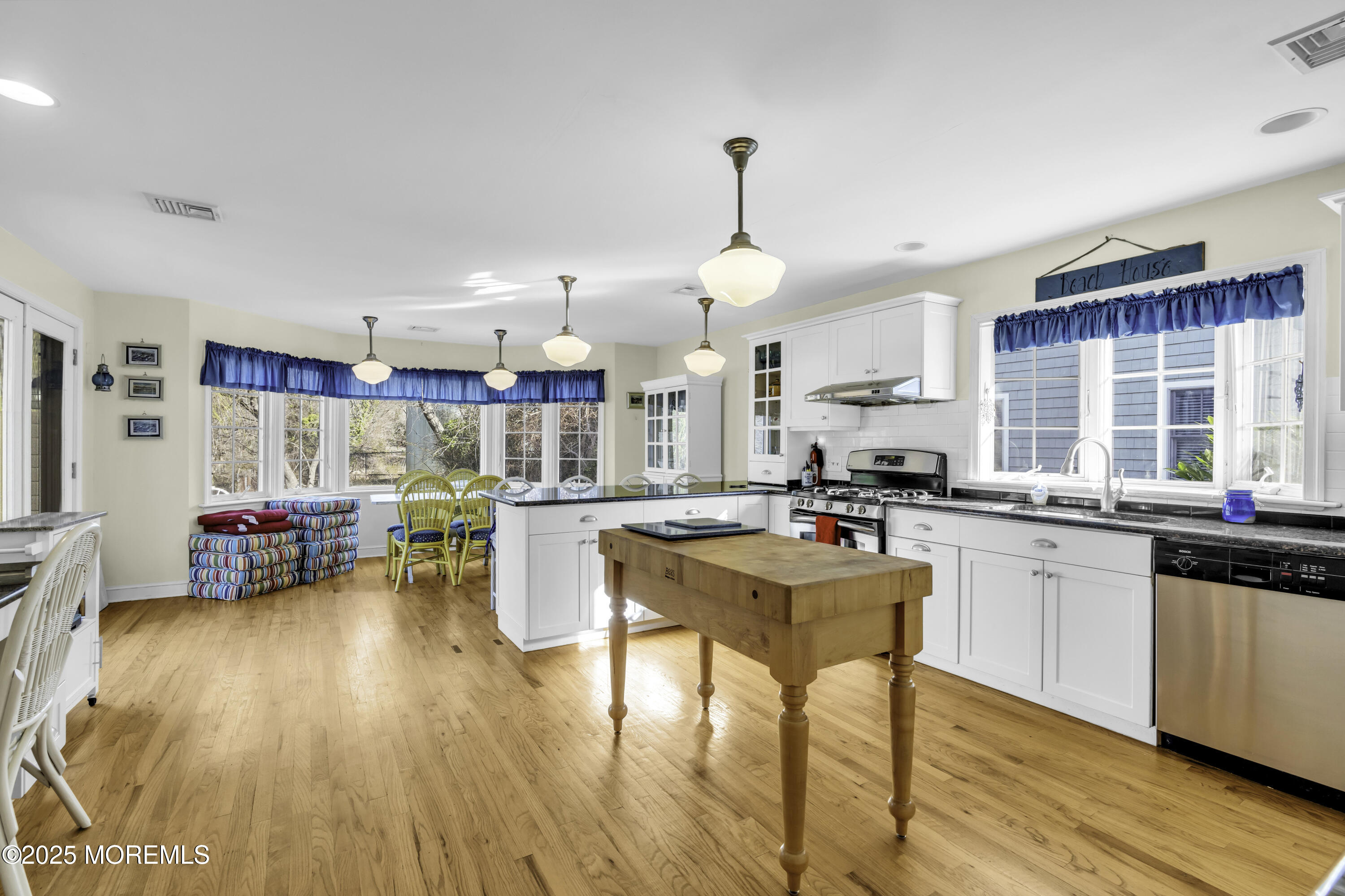 326 South Boulevard Spring Lake, NJ 07762 - Photo 16 of 54 a kitchen that has a lot of cabinets a sink and appliances in it