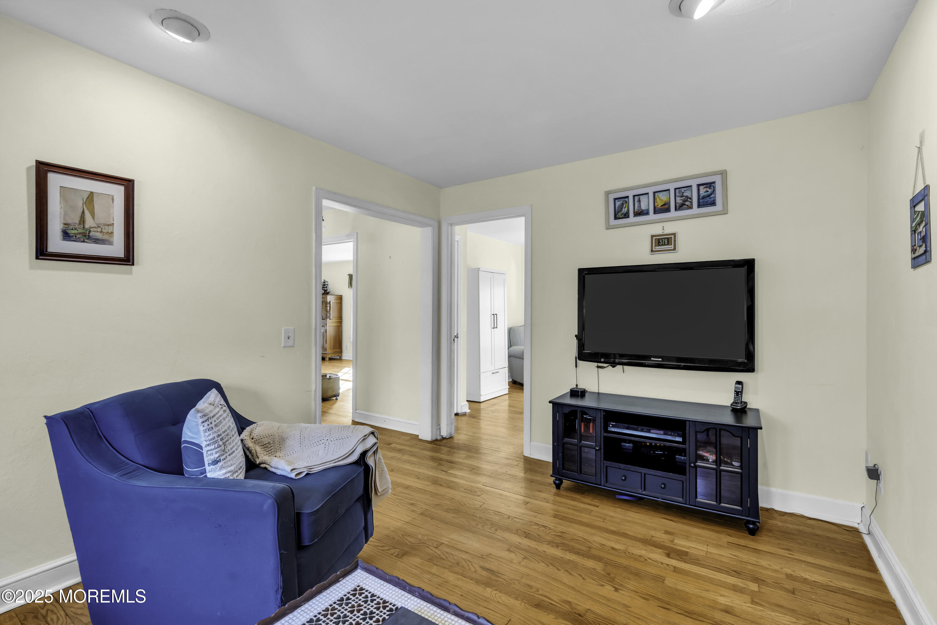 326 South Boulevard Spring Lake, NJ 07762 - Photo 25 of 54 a living room with furniture and a flat screen tv