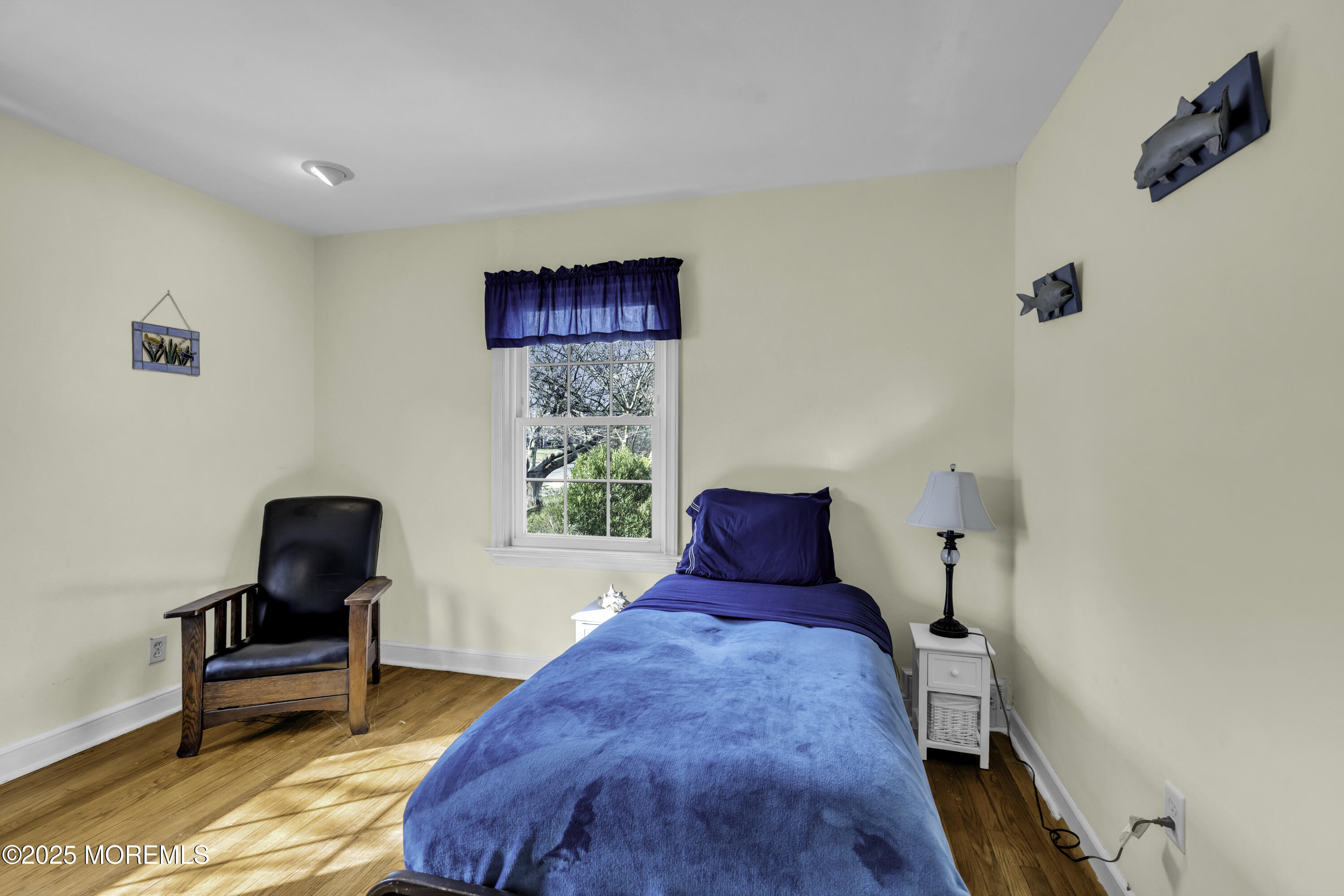 326 South Boulevard Spring Lake, NJ 07762 - Photo 26 of 54 a living room with furniture and a window