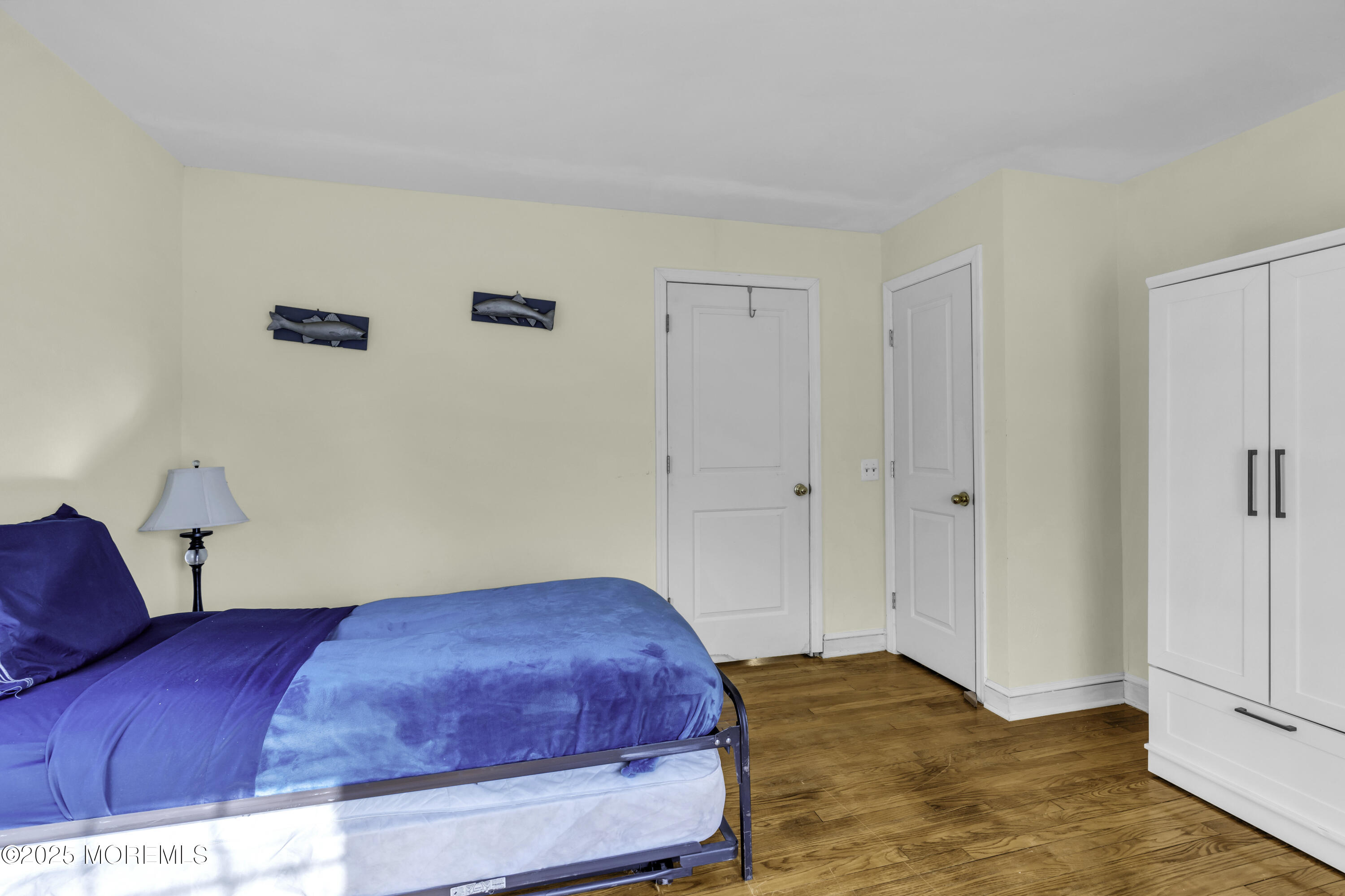 326 South Boulevard Spring Lake, NJ 07762 - Photo 27 of 54 a bedroom with a bed and a night stand