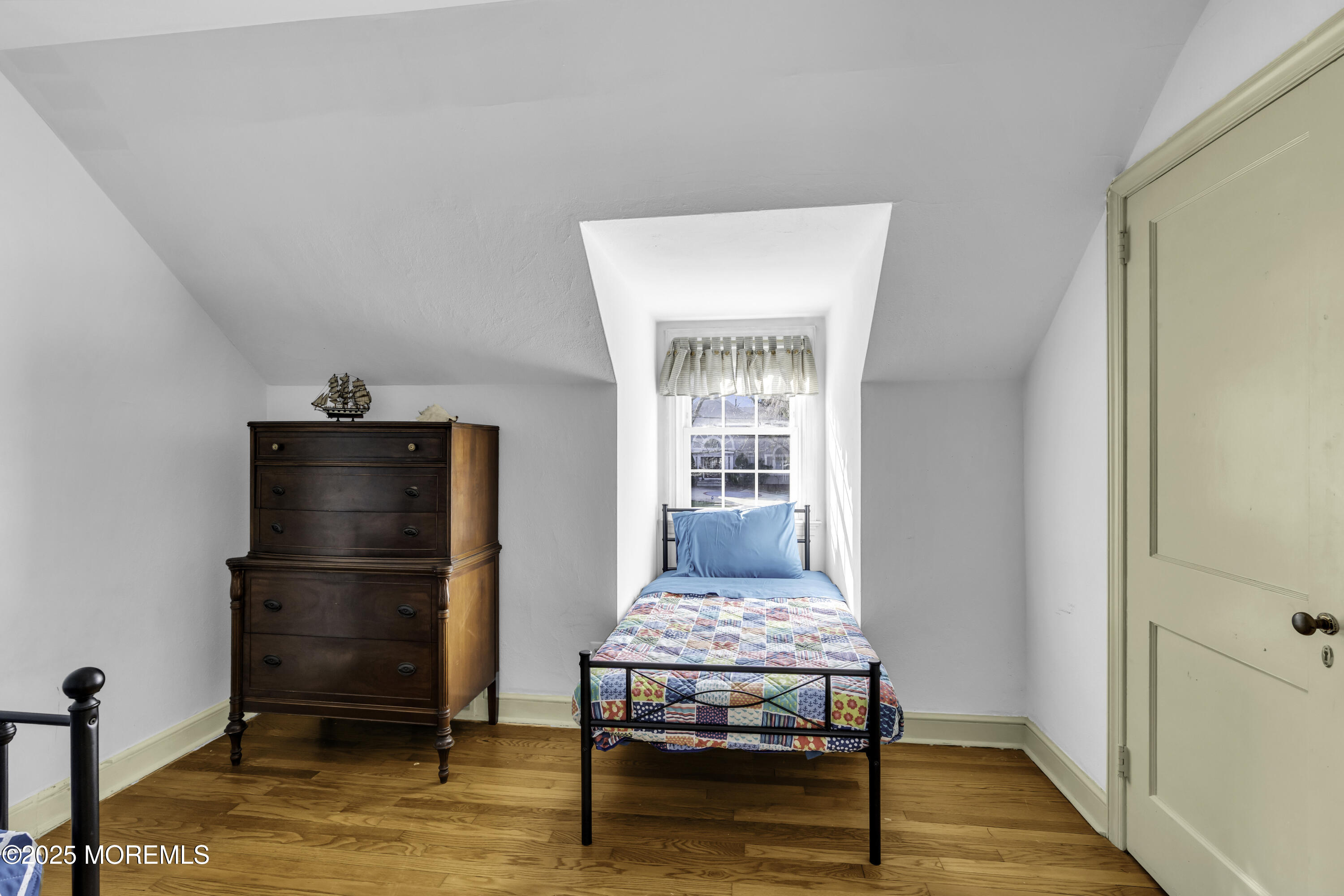 326 South Boulevard Spring Lake, NJ 07762 - Photo 31 of 54 a living room with furniture and a wooden floor