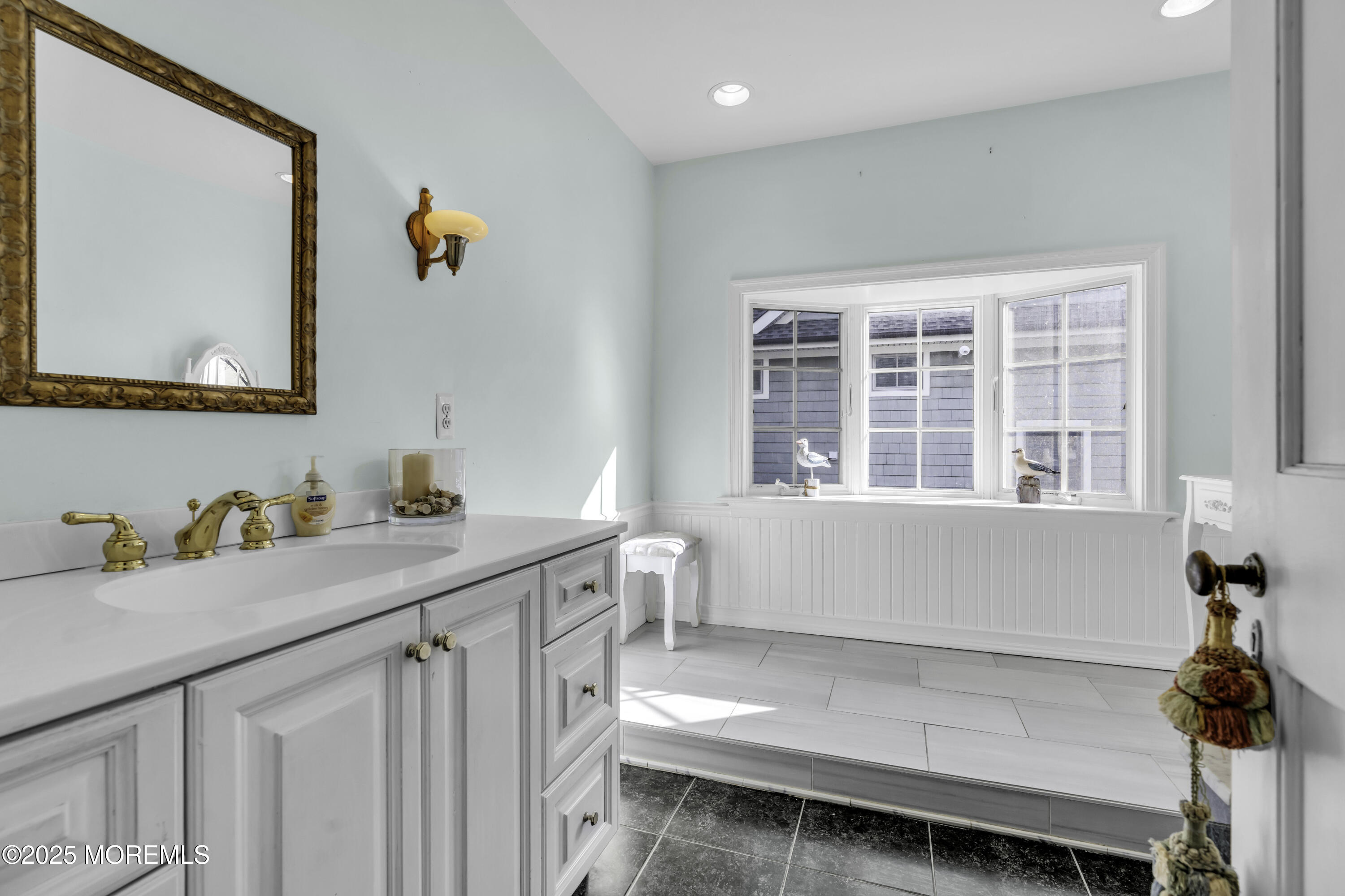 326 South Boulevard Spring Lake, NJ 07762 - Photo 37 of 54 a bathroom with a sink and a mirror