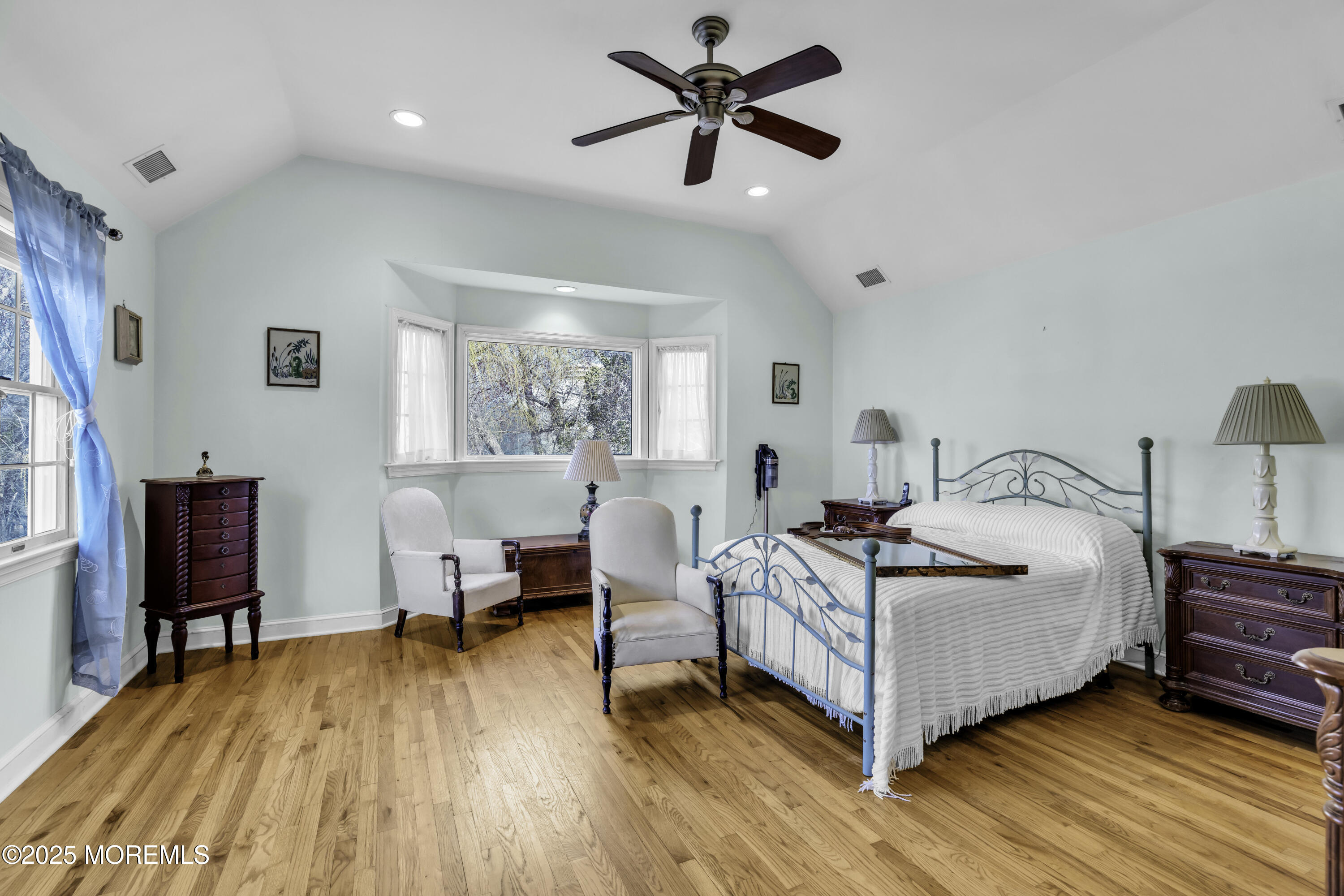 326 South Boulevard Spring Lake, NJ 07762 - Photo 39 of 54 a bedroom with a bed and wooden floor