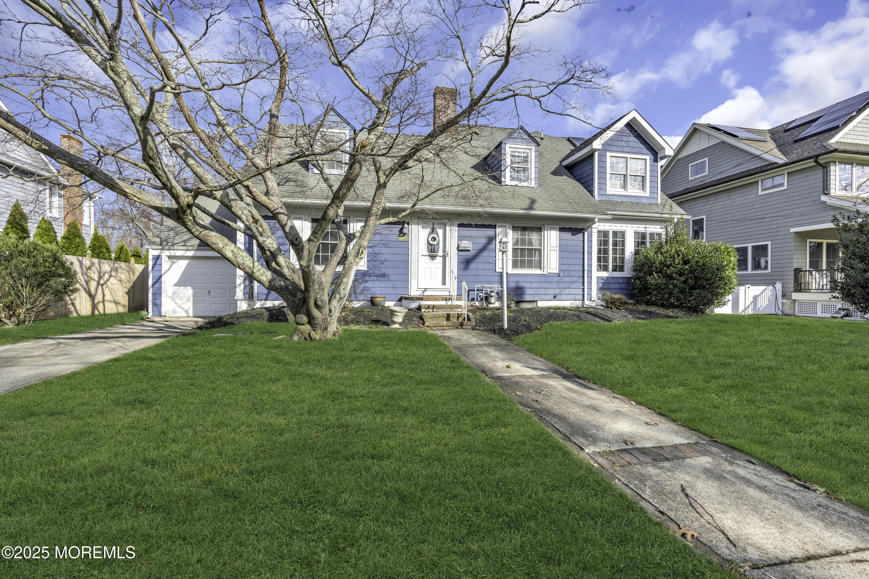 326 South Boulevard Spring Lake, NJ 07762 - Photo 4 of 54 a front view of a house with a yard