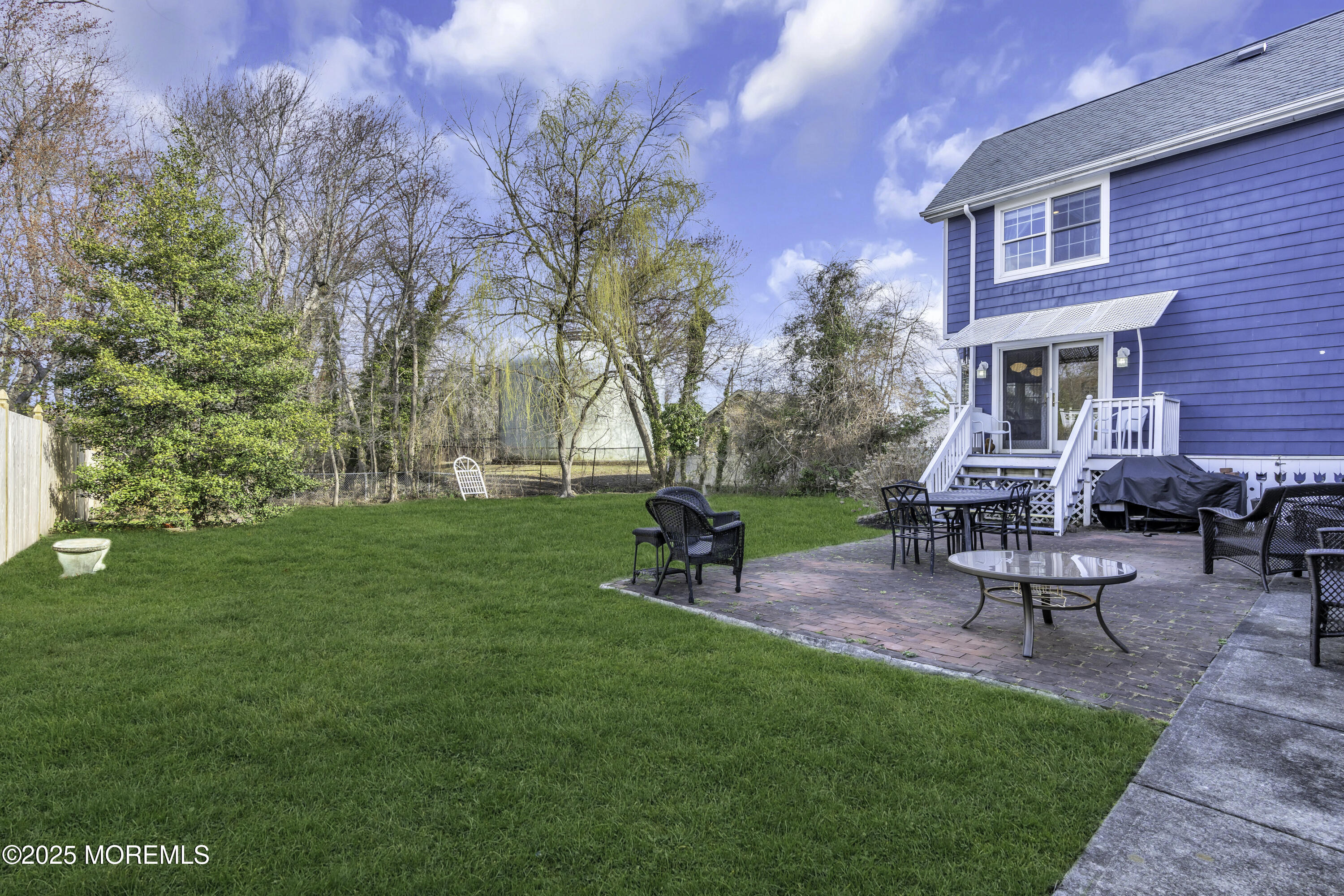 326 South Boulevard Spring Lake, NJ 07762 - Photo 42 of 54 a view of a house with backyard sitting area and garden