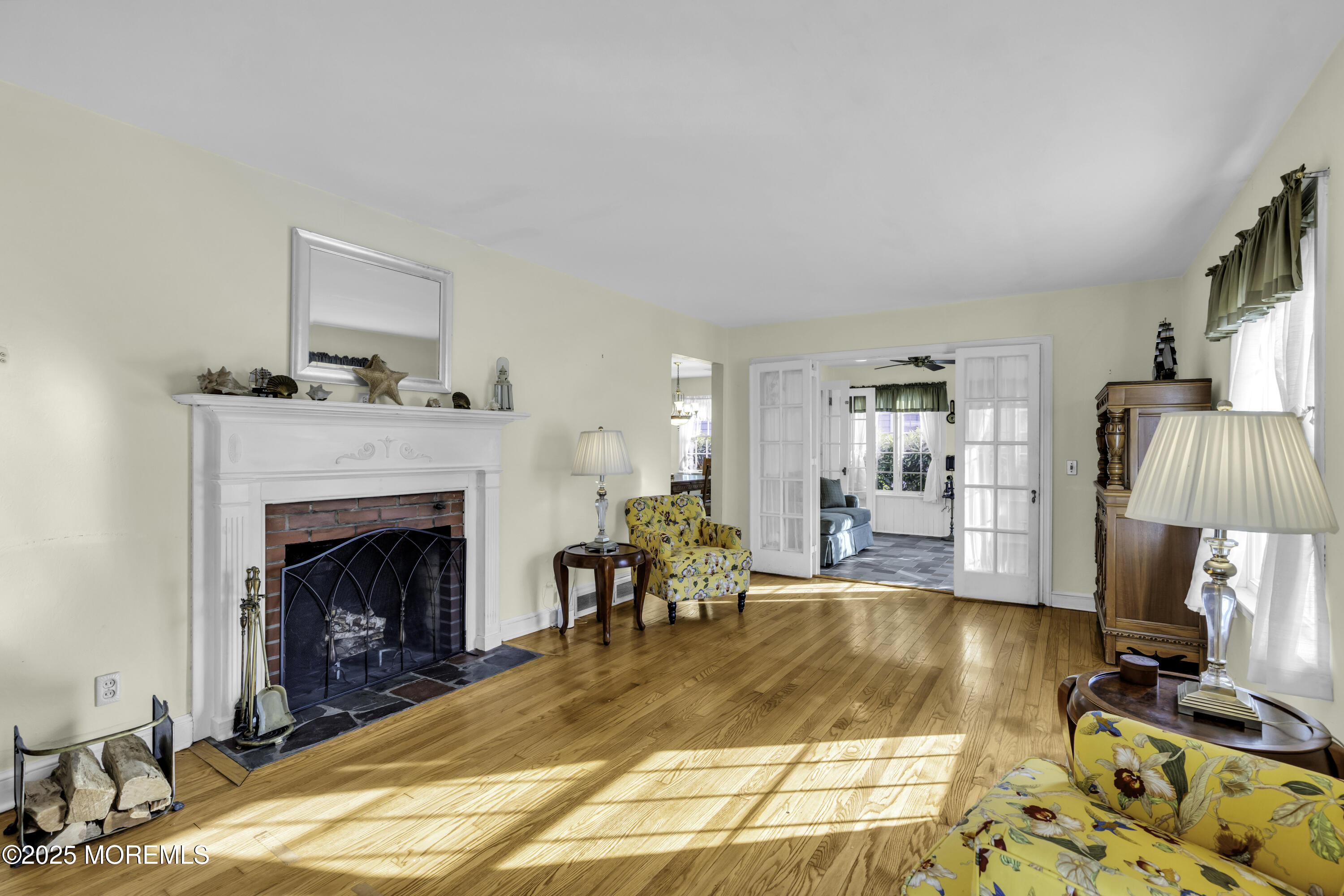326 South Boulevard Spring Lake, NJ 07762 - Photo 46 of 54 a living room with furniture and a fireplace