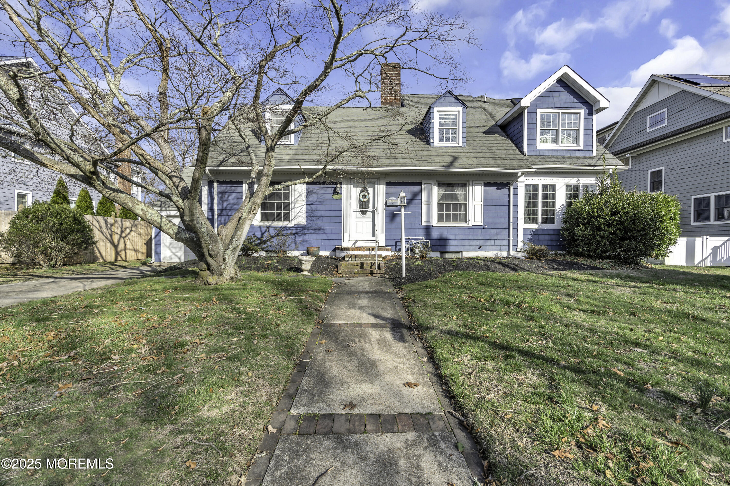 326 South Boulevard Spring Lake, NJ 07762 - Photo 48 of 54 a front view of a house with garden