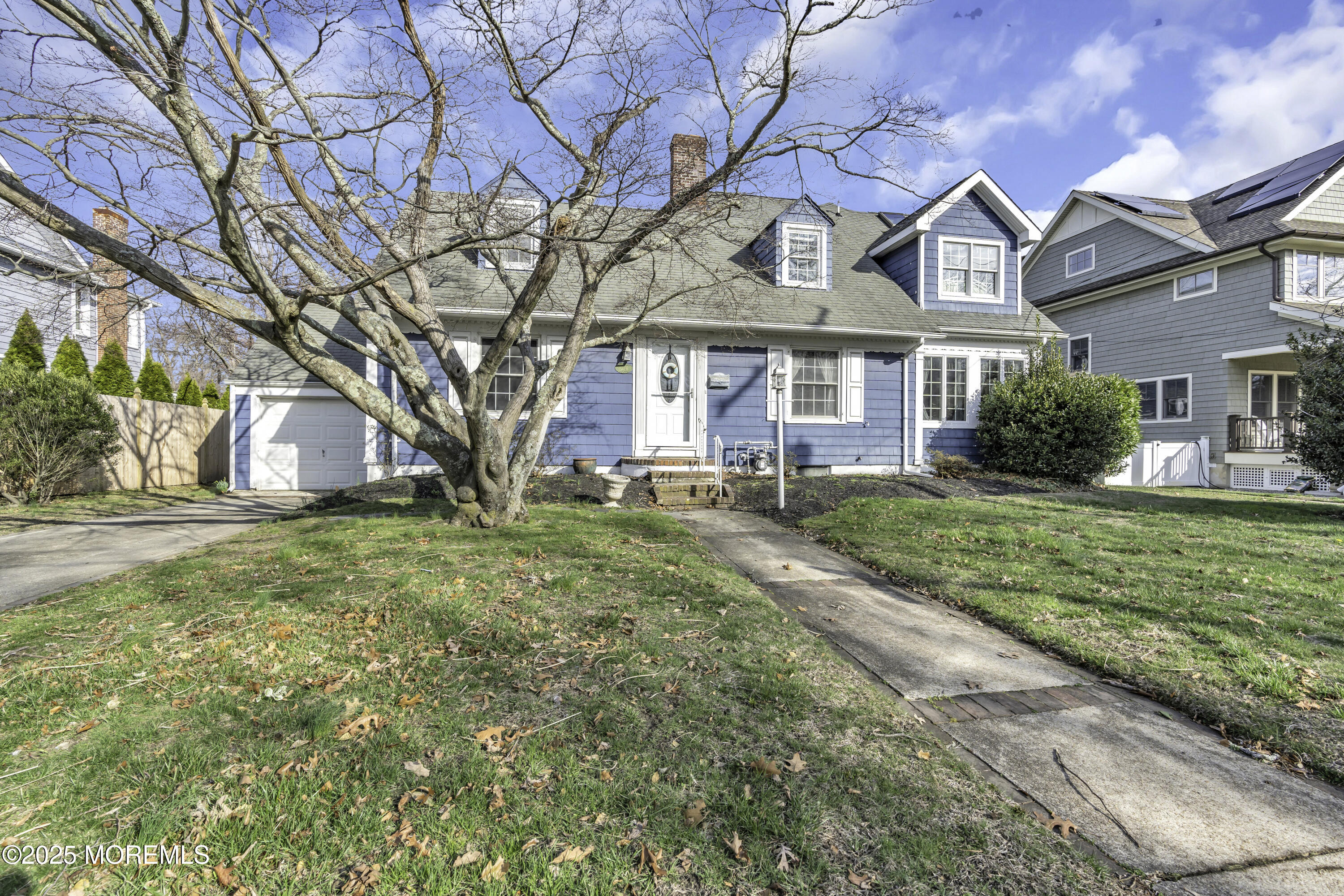326 South Boulevard Spring Lake, NJ 07762 - Photo 50 of 54 a front view of a house with a yard