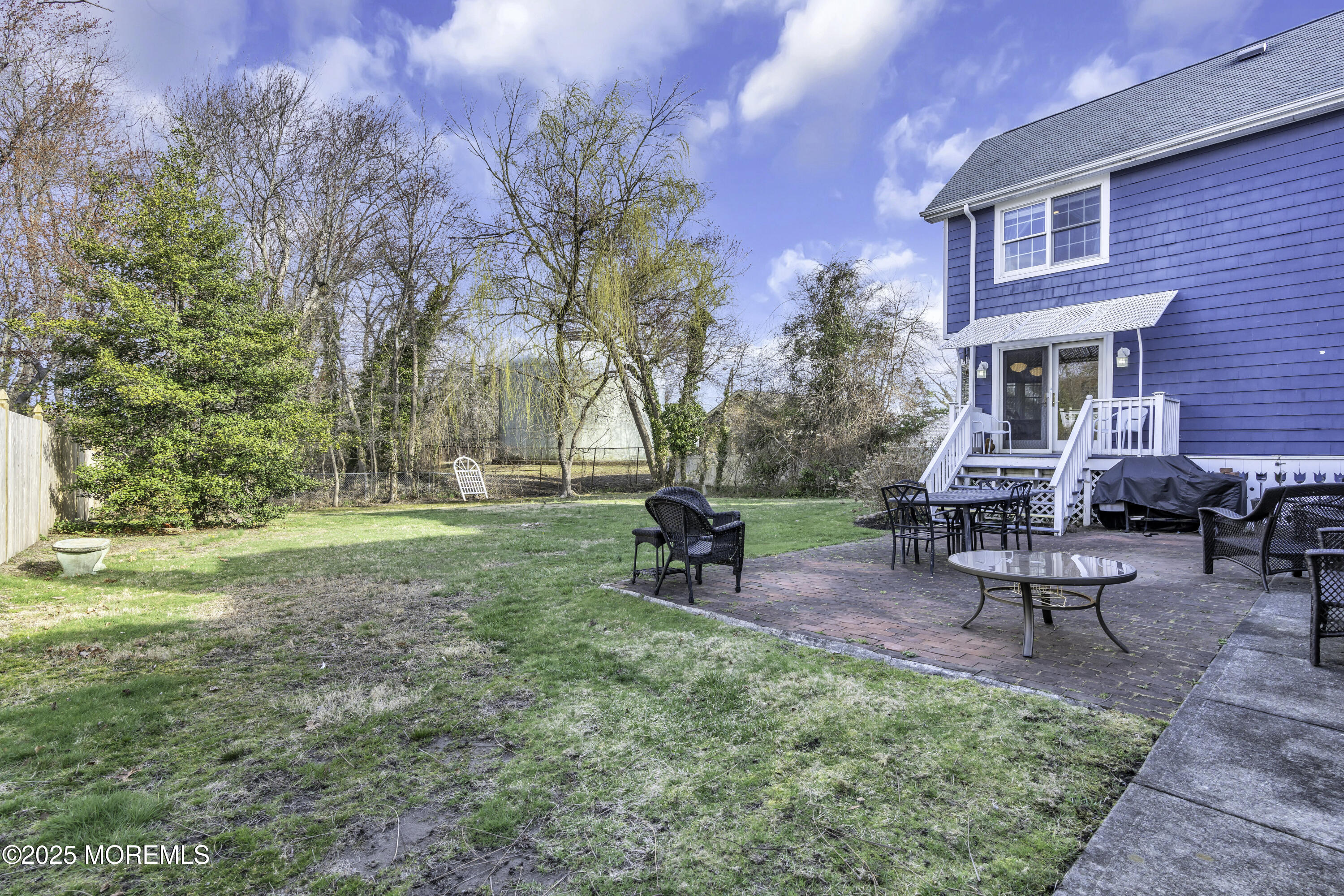 326 South Boulevard Spring Lake, NJ 07762 - Photo 51 of 54 a view of a house with backyard porch and sitting area