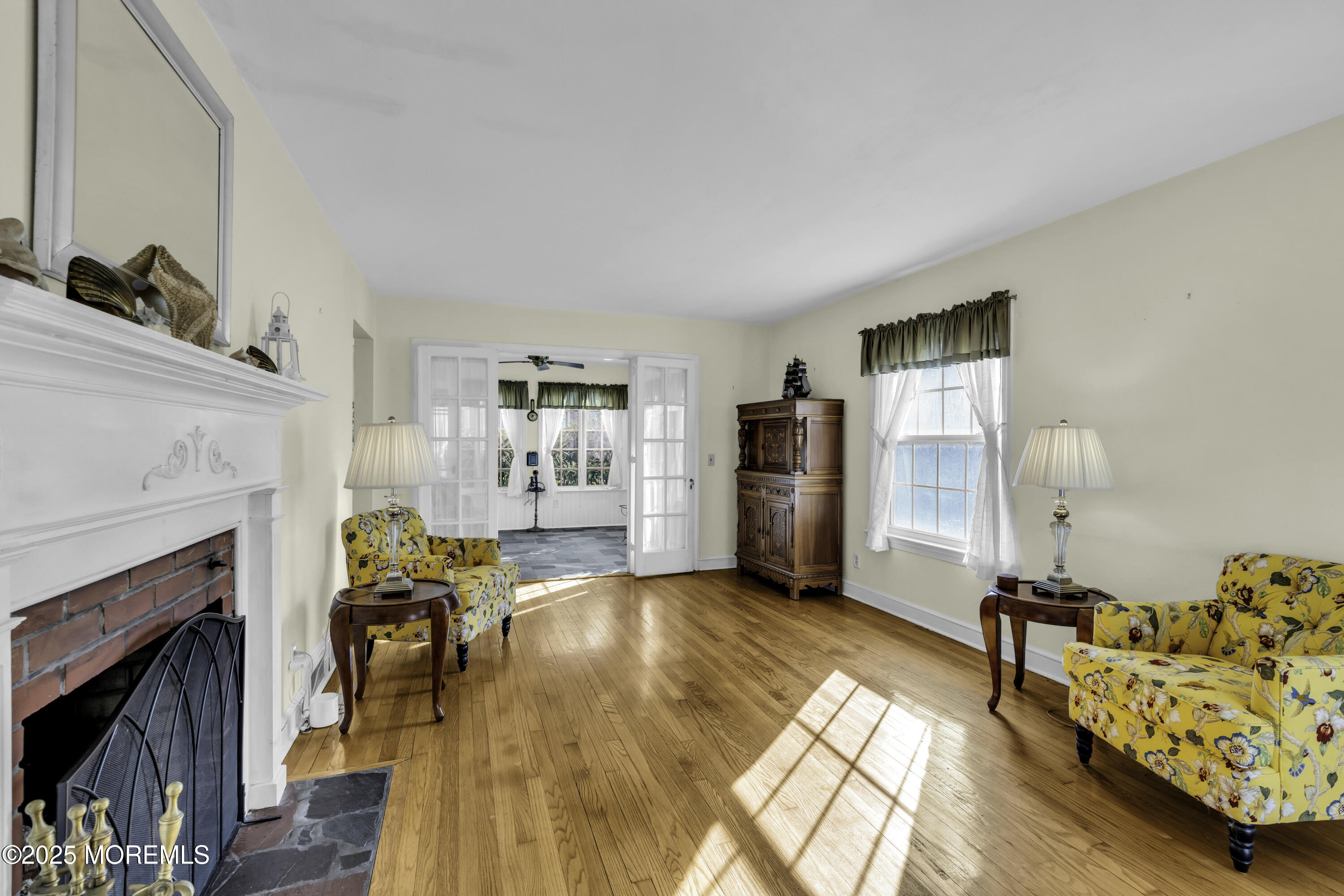 326 South Boulevard Spring Lake, NJ 07762 - Photo 8 of 54 a living room with furniture and a fireplace
