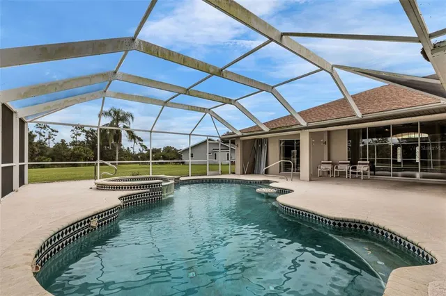 $409,900 | 27052 Paratins Drive, Punta Gorda, FL 33983