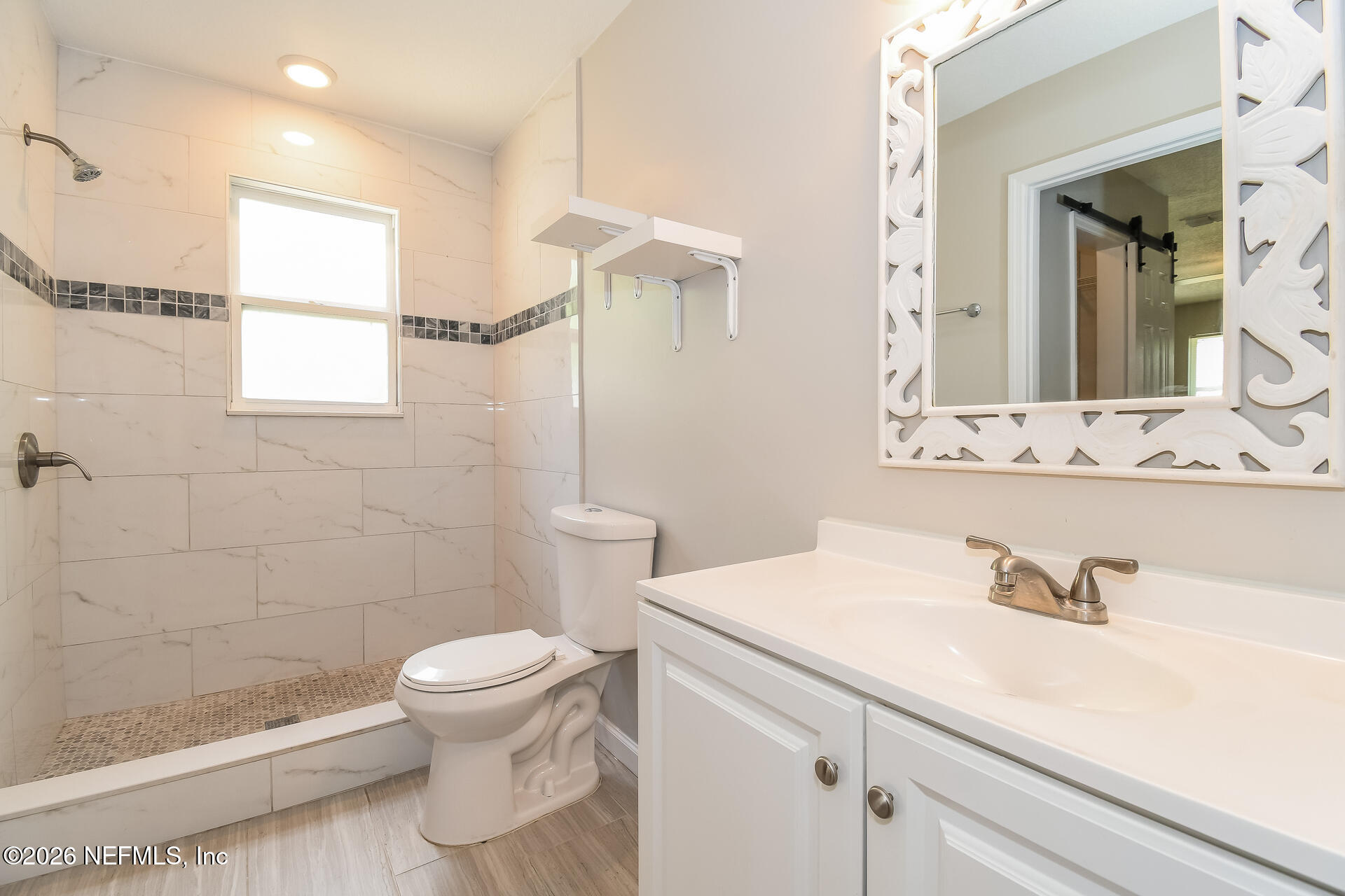 6064 Gulf Road West Jacksonville, FL 32244 - Photo 16 of 21 016-photo-main-bathroom-15504943