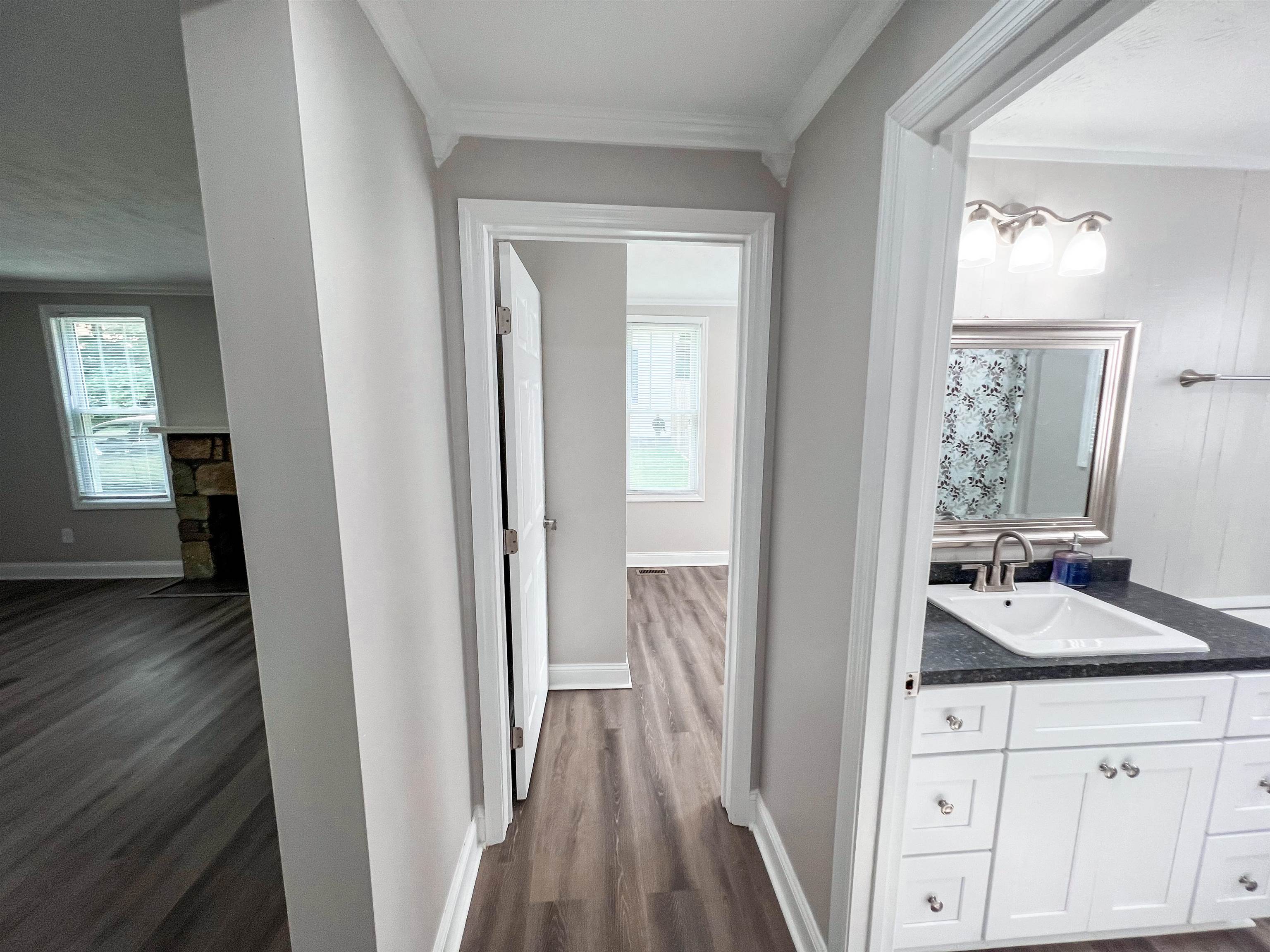 202 Morris Street Waynesboro, TN 38485 - Photo 6 of 36 Hall featuring ornamental molding and dark wood-style floors