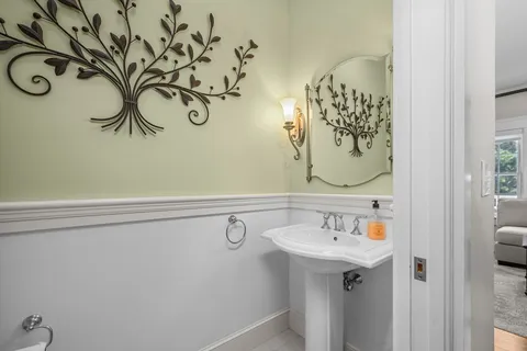 a bathroom with a sink and mirror