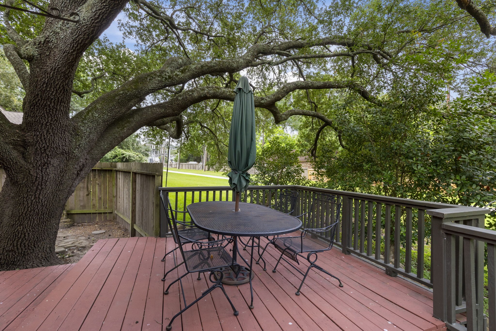 49 April Village Conroe, TX 77356 - Photo 19 of 46 a view of a deck with furniture and a backyard