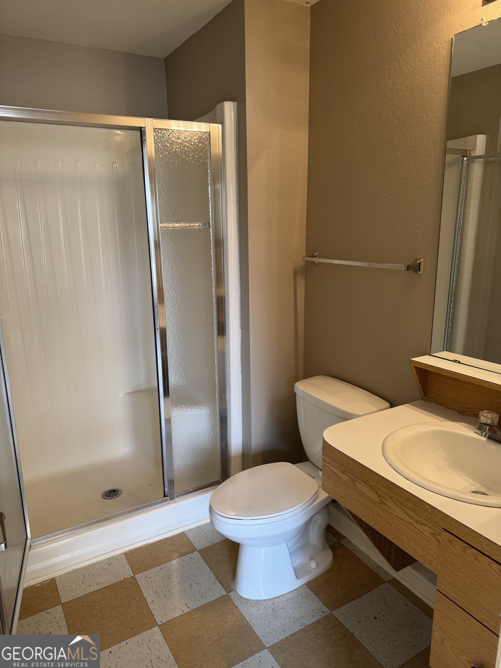 211 North Avenue, Unit 1332 Athens, GA 30601 - Photo 10 of 14 a white toilet sitting next to a bath tub