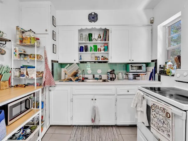 a workspace with furniture and a window