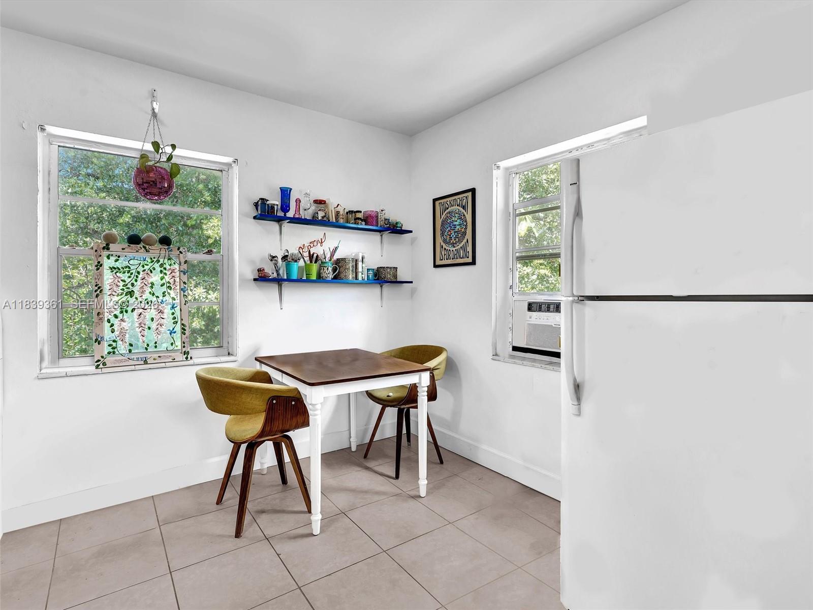 3210 Elizabeth Street Miami, FL 33133 - Photo 25 of 69 a workspace with furniture and a window