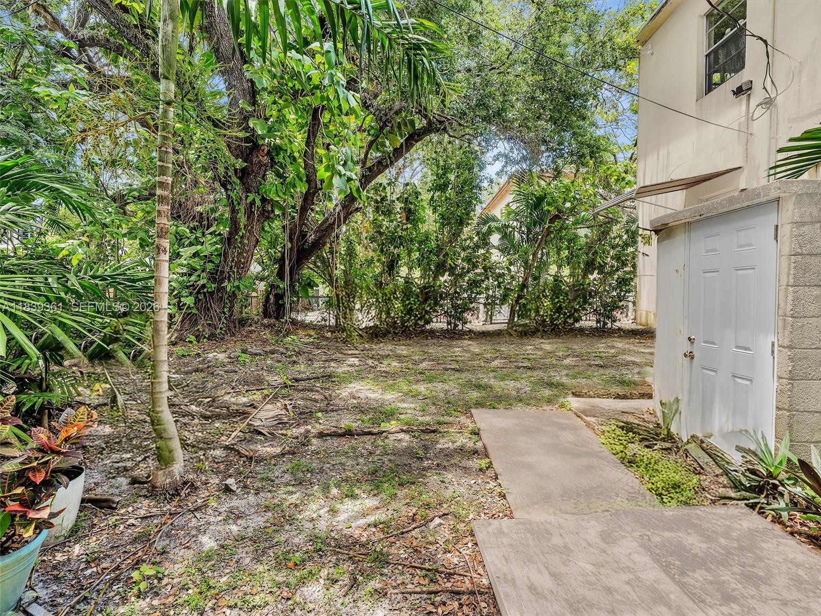 3210 Elizabeth Street Miami, FL 33133 - Photo 32 of 69 a view of backyard with green space