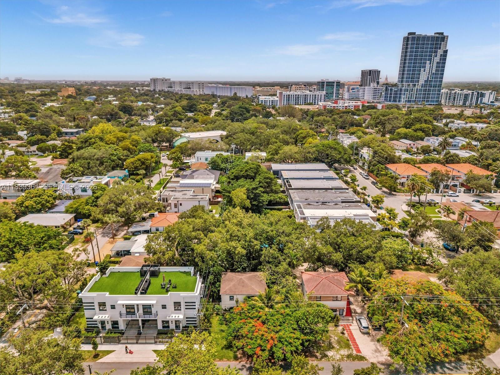 3210 Elizabeth Street Miami, FL 33133 - Photo 36 of 69 an aerial view of residential houses with city view