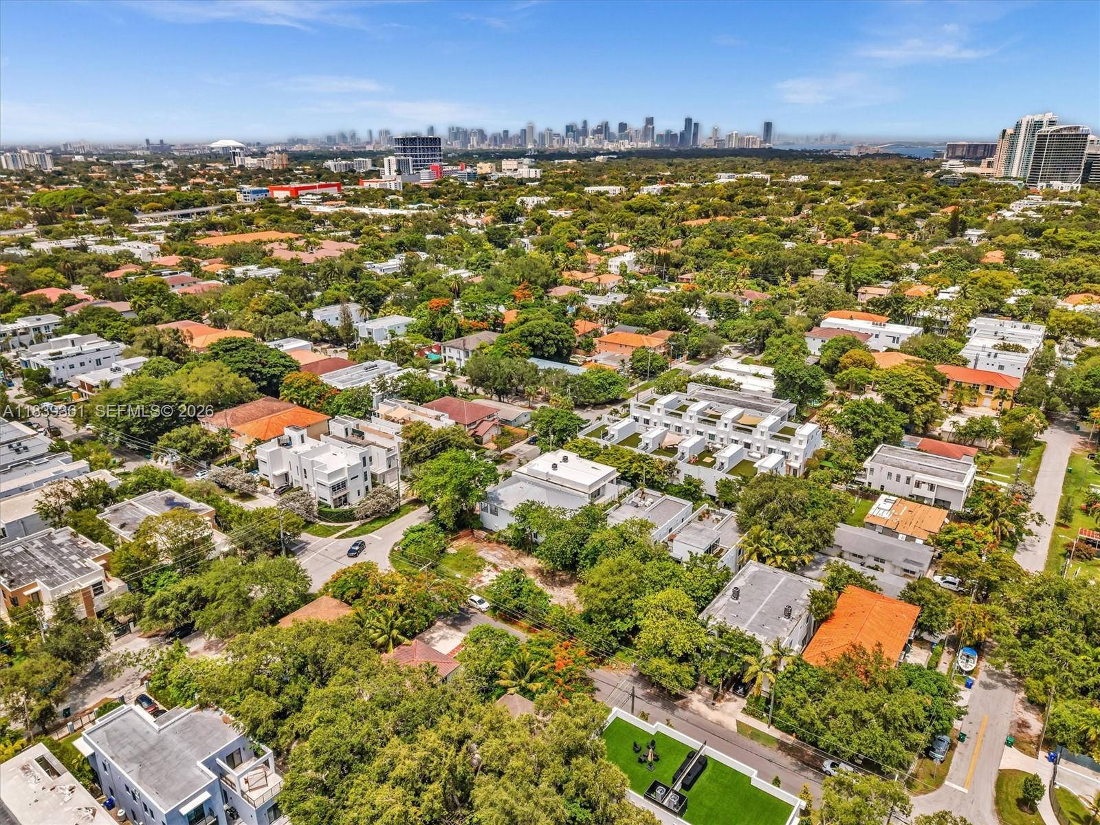 3210 Elizabeth Street Miami, FL 33133 - Photo 39 of 69 an aerial view of residential houses with outdoor space