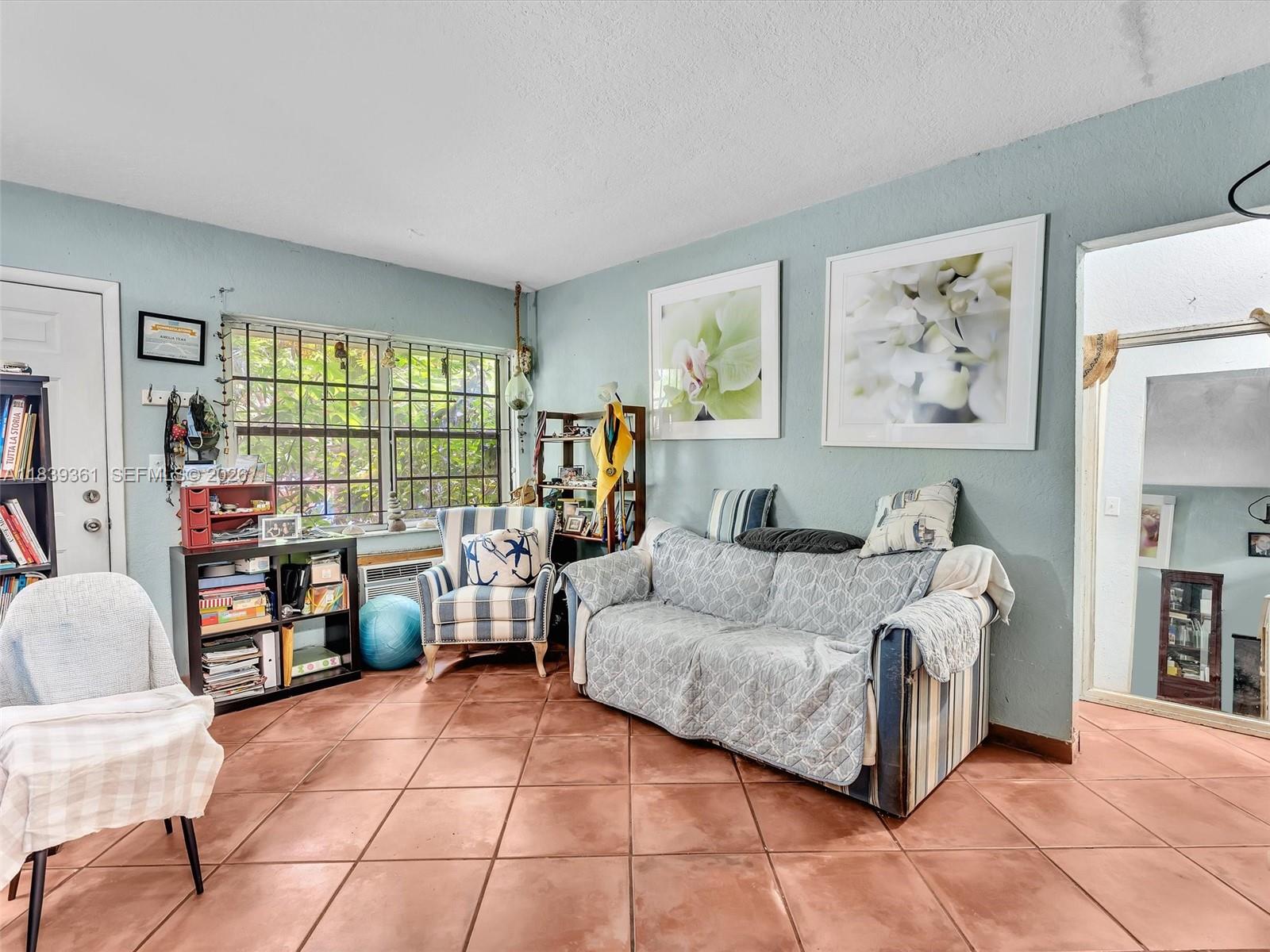 3210 Elizabeth Street Miami, FL 33133 - Photo 61 of 69 a living room with furniture and a window