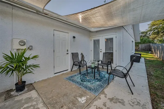 an aerial view of residential house with outdoor space and swimming pool