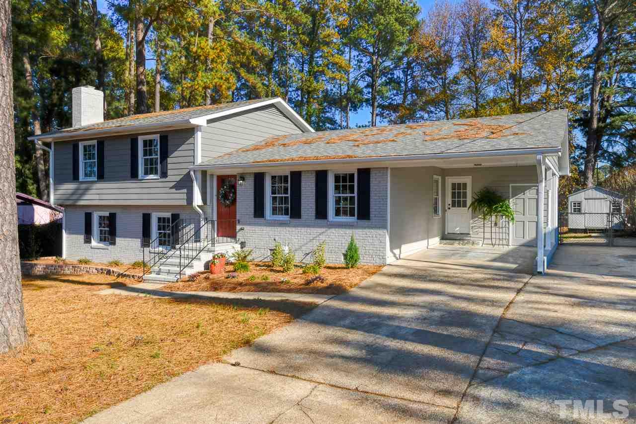 1604 Laura Duncan Road Apex, NC 27502 - Photo 2 of 30 Notice the Storage at the end of Carport