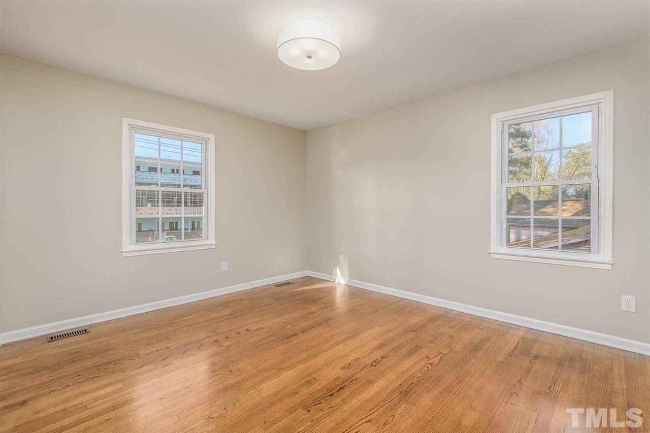 1604 Laura Duncan Road Apex, NC 27502 - Photo 23 of 30 Original Hardwood floors in all the bedrooms.