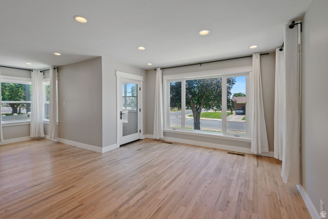 1214 North 300 West Mapleton, UT 84664 - Photo 5 of 33 Spacious living room featuring hard wood flooring, fresh paint, recessed lighting, and new Milgard Windows