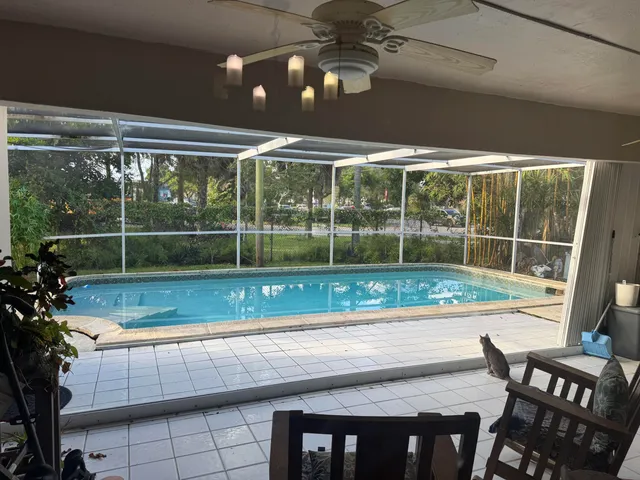 a view of outdoor space swimming pool and outdoor seating