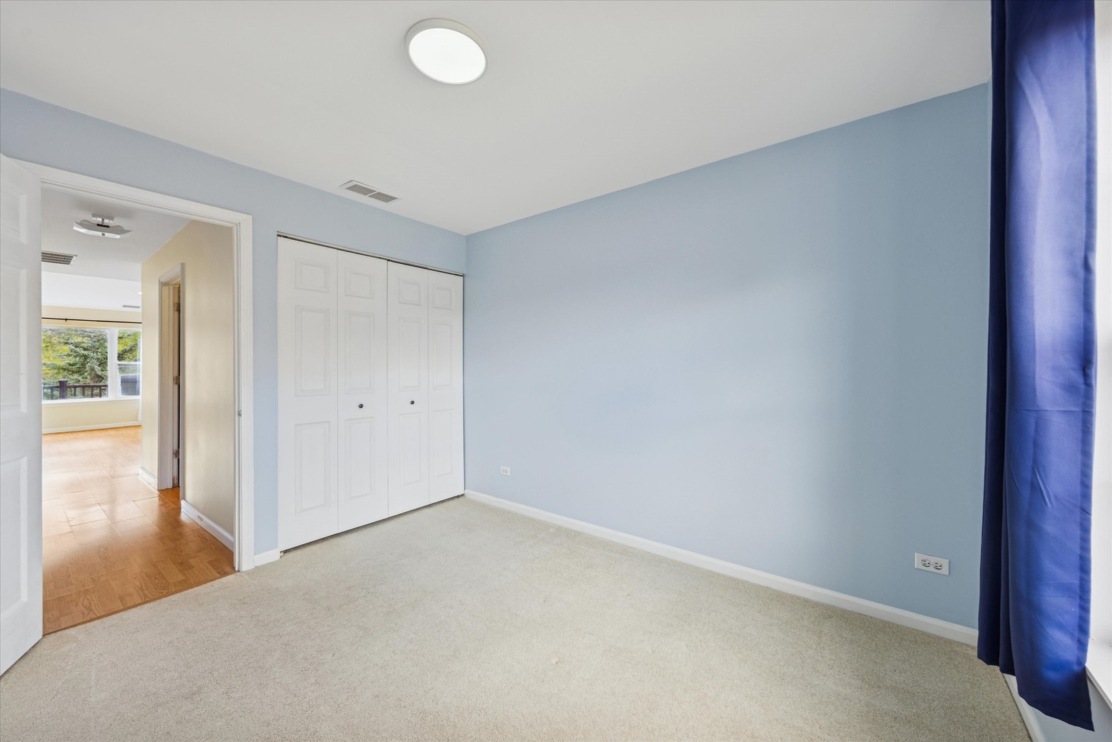 1101 Yorkshire Court, Unit C Elgin, IL 60120 - Photo 15 of 19 wooden floor in an empty room