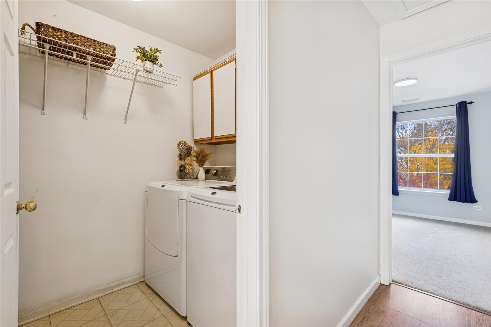 1101 Yorkshire Court, Unit C Elgin, IL 60120 - Photo 17 of 19 a utility room with dryer and washer