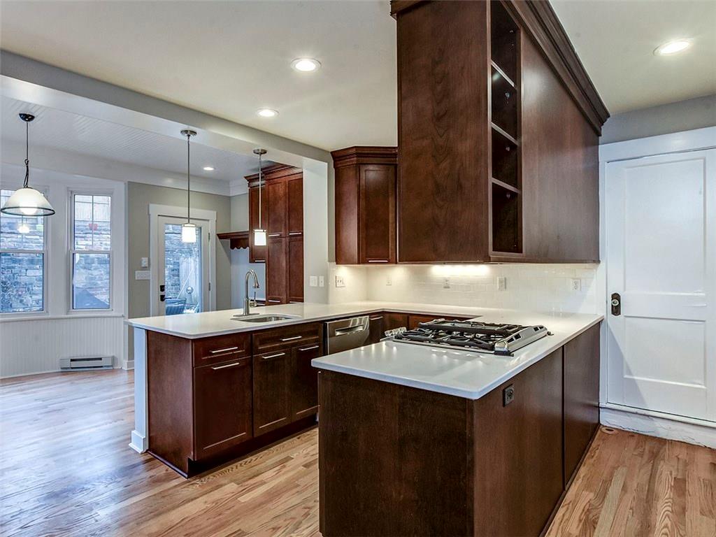 5601 Marlborough Road Pittsburgh, PA 15217 - Photo 11 of 25 BEAUTIFUL QUARTZ COUNTERS TOP THESE GORGEOUS CABINETS
