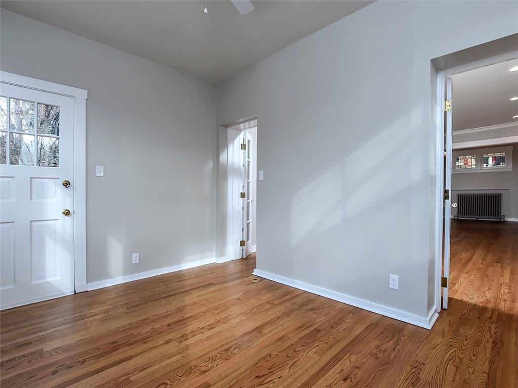 5601 Marlborough Road Pittsburgh, PA 15217 - Photo 6 of 25 THE FIRST FLOOR 4 SEASON/BONUS ROOM OFFERS ACCESS TO THE GARAGE AND REAR PATIO...AND FRENCH DOORS SEPARATE THE ROOM FROM THE LIVING ROOM.