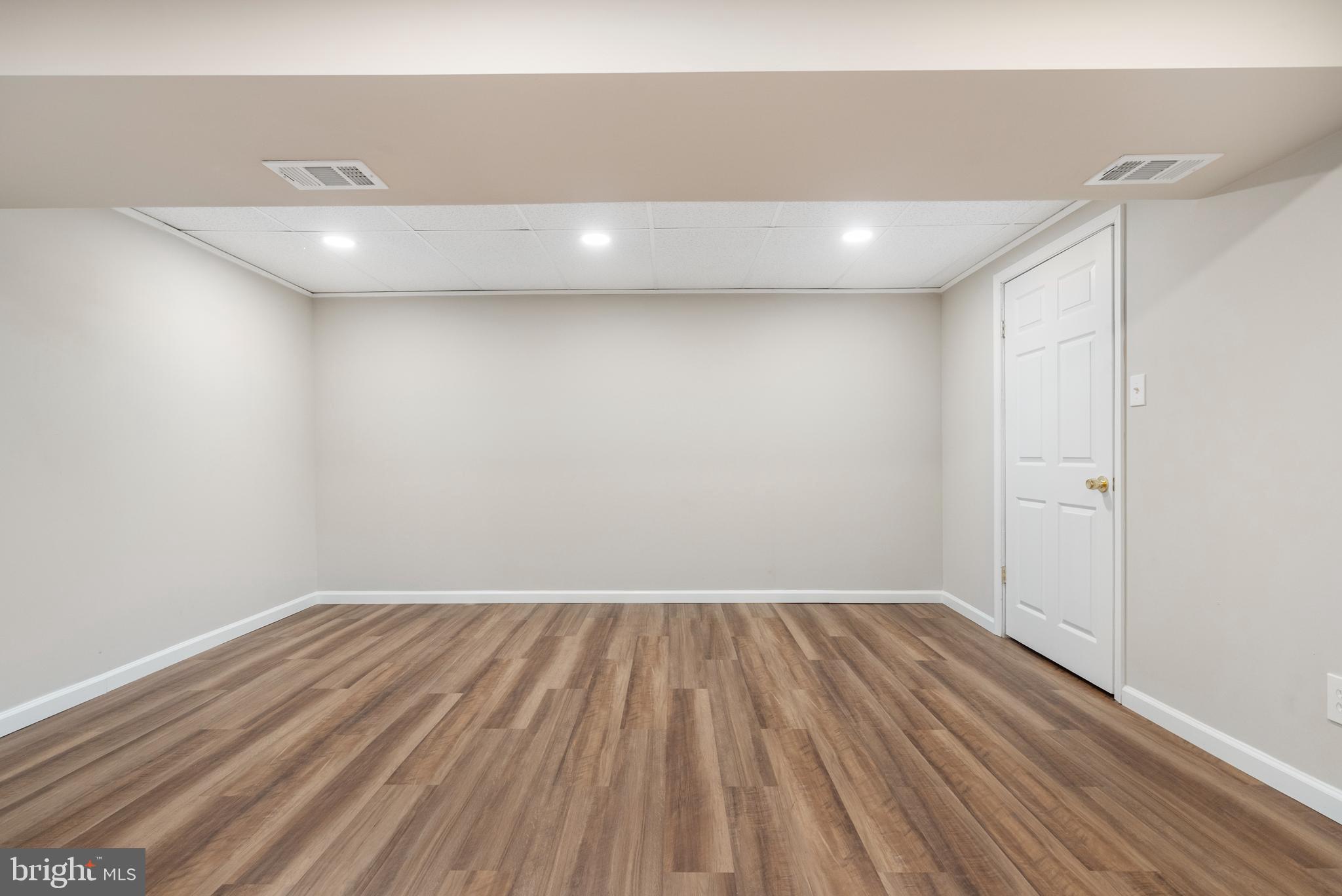 93 Ridgelawn Road, Unit B Reisterstown, MD 21136 - Photo 22 of 26 Lower Level Family Room