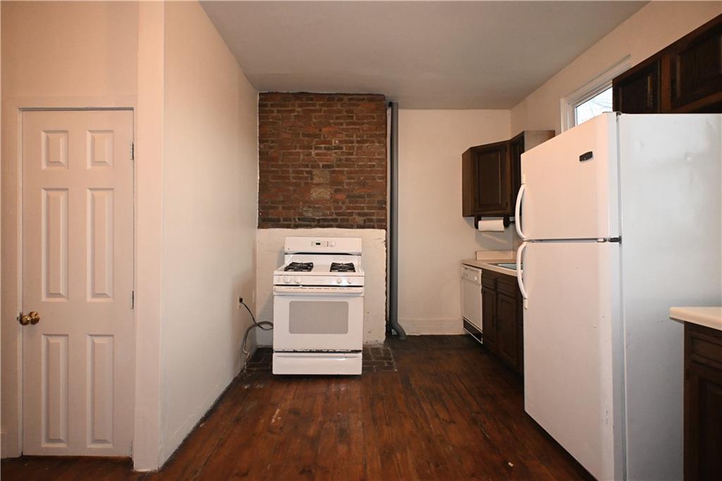 417 Lawn Street Pittsburgh, PA 15213 - Photo 12 of 26 a view of a storage & utility room with washer and dryer