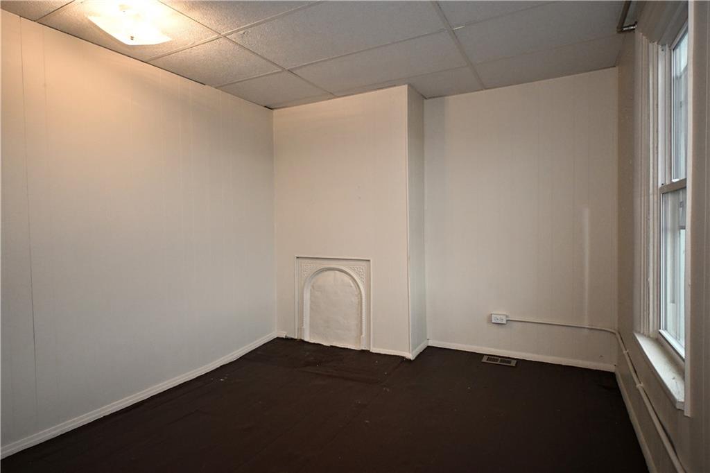 417 Lawn Street Pittsburgh, PA 15213 - Photo 18 of 26 a view of an empty room and window