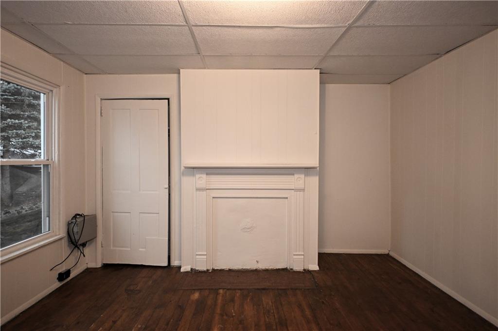 417 Lawn Street Pittsburgh, PA 15213 - Photo 20 of 26 a view of a room with wooden floor and cabinet