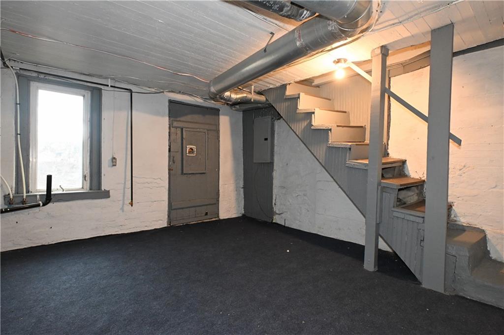 417 Lawn Street Pittsburgh, PA 15213 - Photo 25 of 26 a view of an empty room with stairs