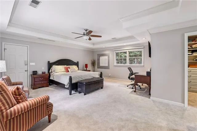 a bedroom with furniture and a couch