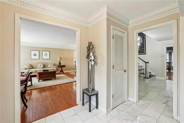 a view of a livingroom with furniture and front door