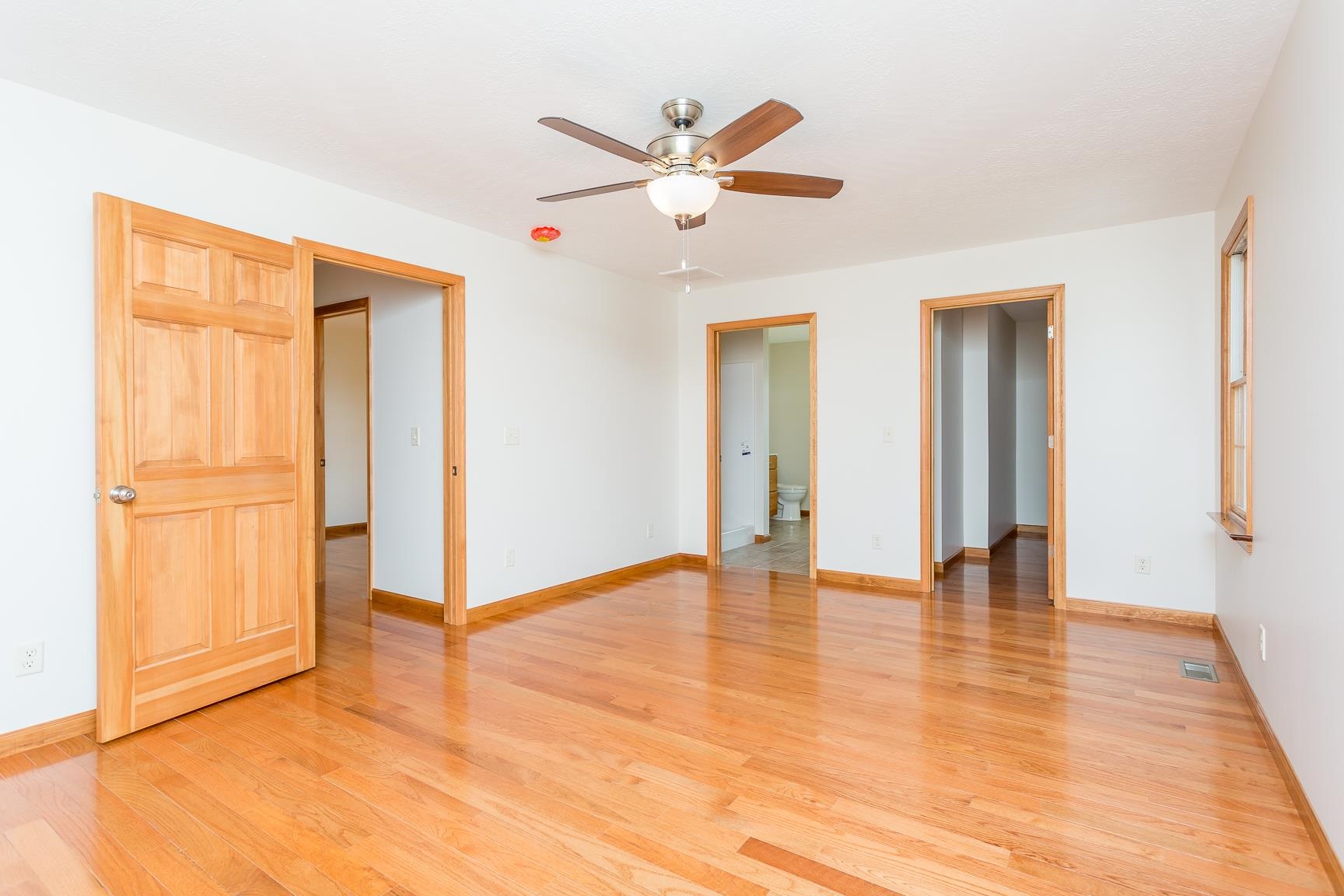 297 Battlefield Road Waynesboro, VA 22980 - Photo 26 of 61 a view of an empty room with window and wooden floor