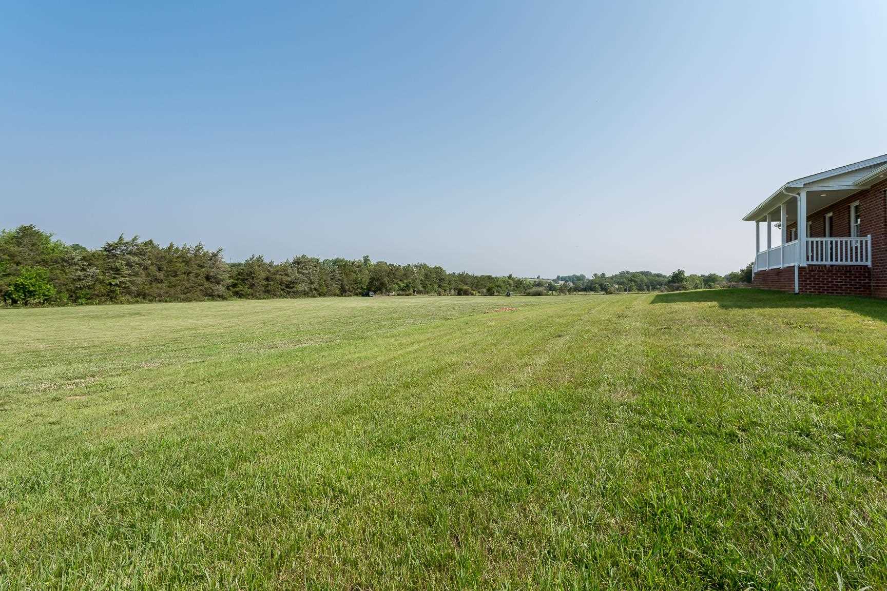 297 Battlefield Road Waynesboro, VA 22980 - Photo 53 of 61 a view of a lake with houses in the background