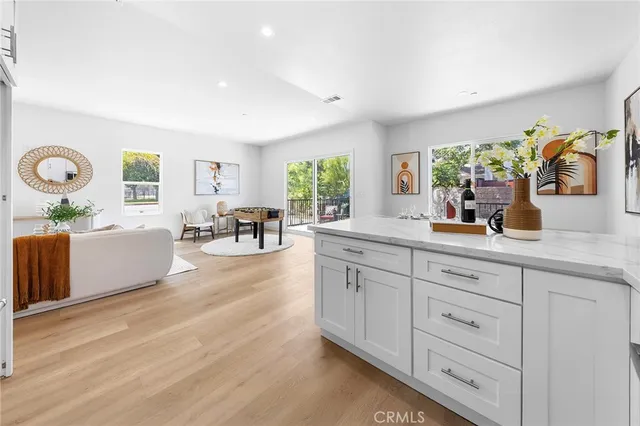 a bedroom with furniture and a bed