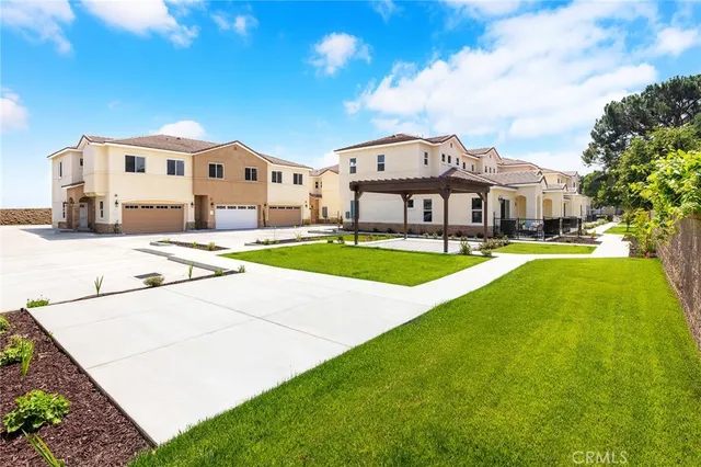 an aerial view of a house with a garden