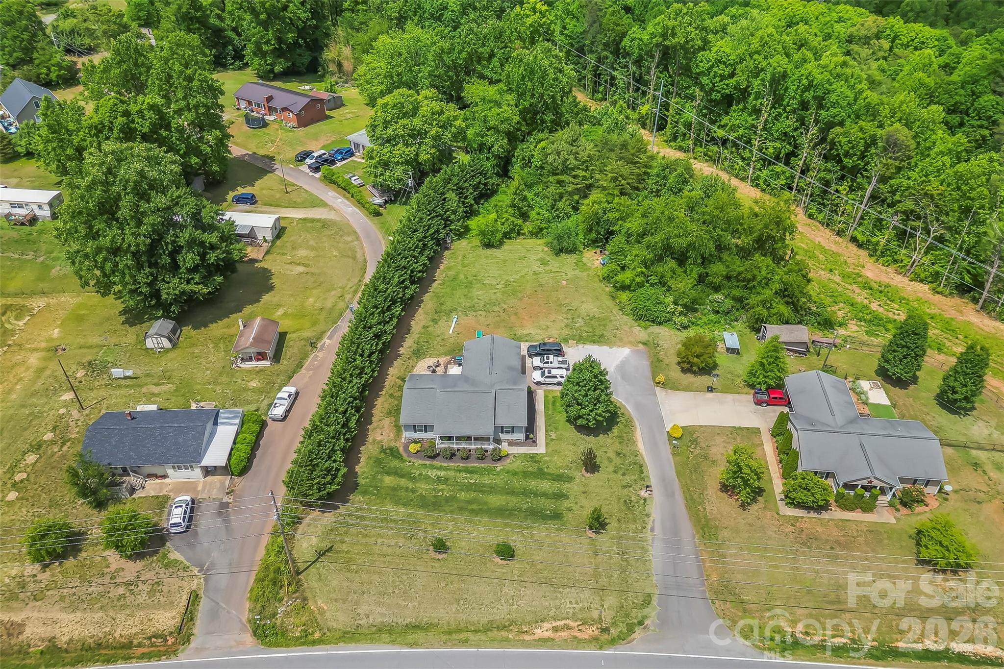 1498 Salem Road Morganton, NC 28655 - Photo 31 of 32 an aerial view of residential houses with outdoor space