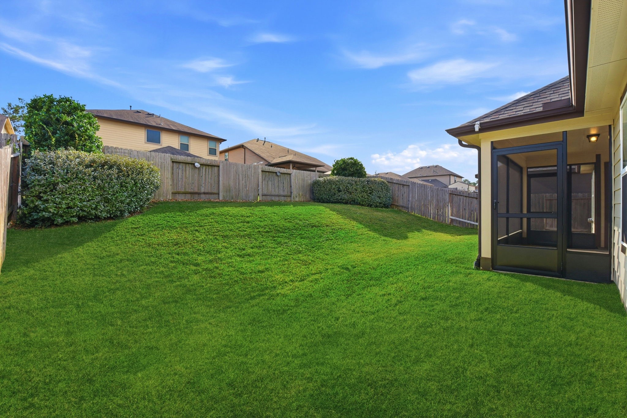 12411 Southern Trail Court Magnolia, TX 77354 - Photo 14 of 38 a view of a back yard of the house